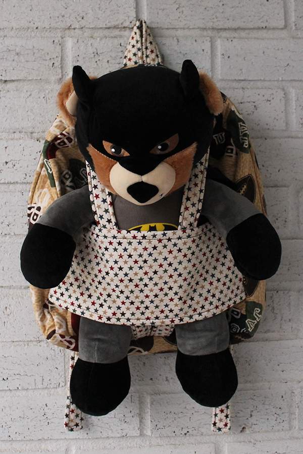 Football Star Doll Carrier Backpack with Build-a-Bear animal inside it